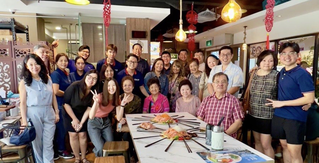 CharB team and guests at a Chinese New Year yu sheng gathering